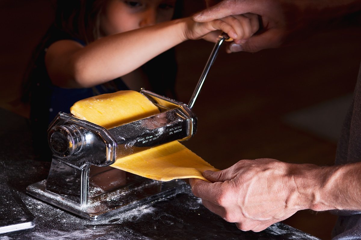 child using pasta machine